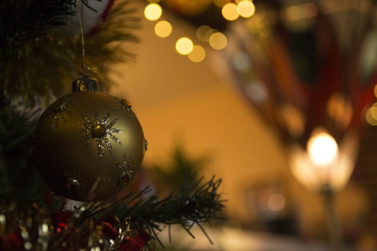 tilt-shift lens photo of gold Christmas bauble