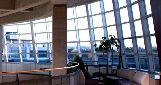 a large room with a lot of windows in it